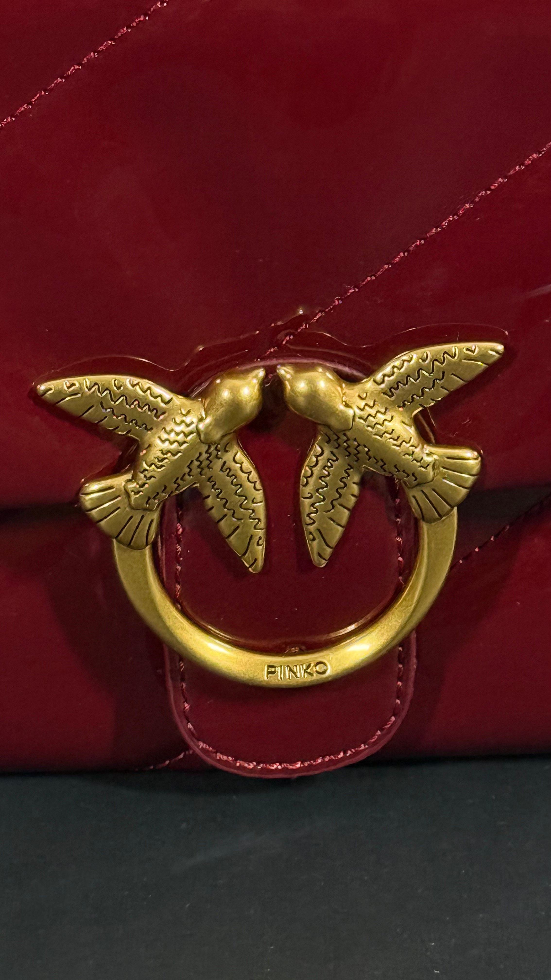 Love baby puff bag in red leather